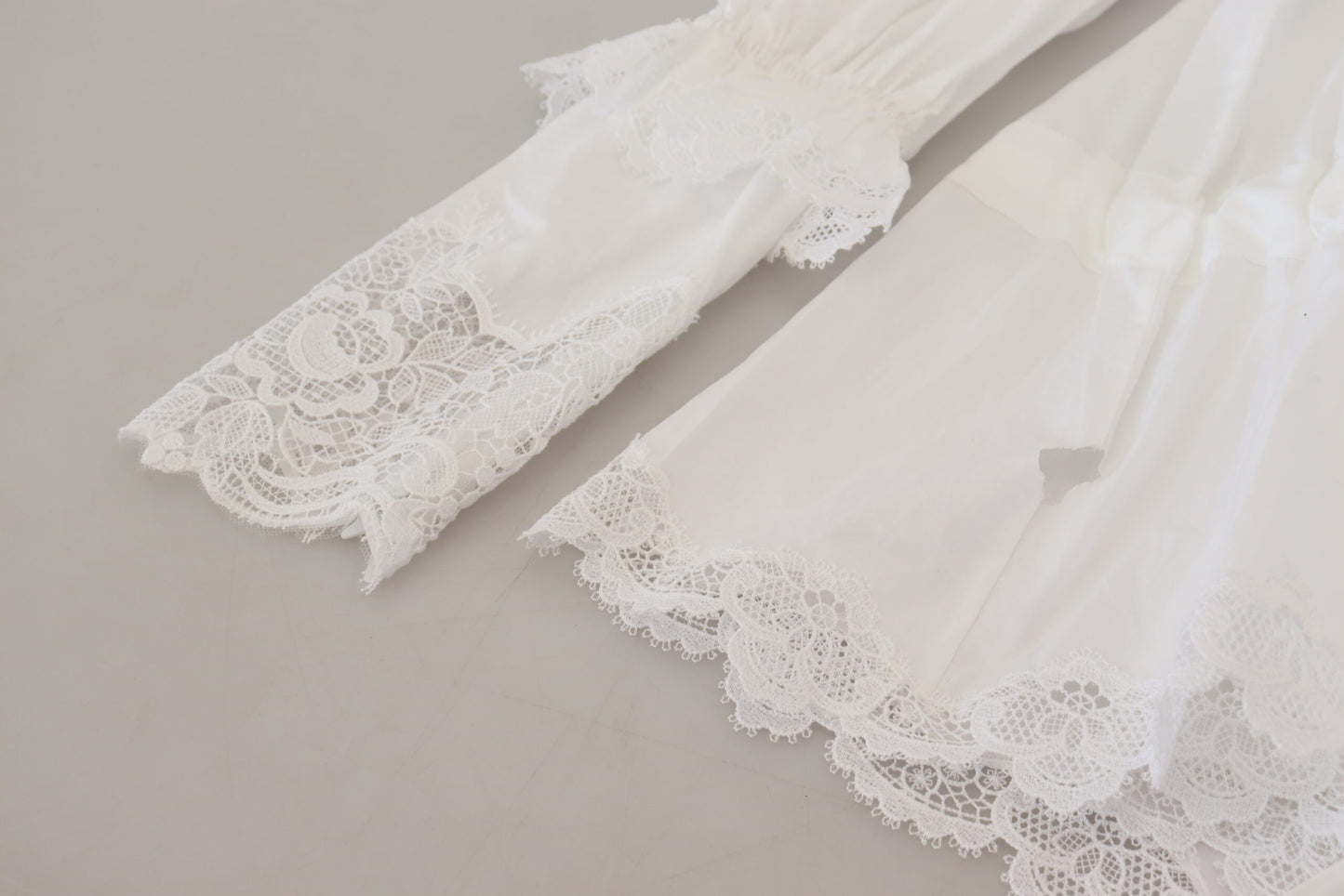 Haut à col roulé Dolce & Gabbana en coton blanc orné de dentelle