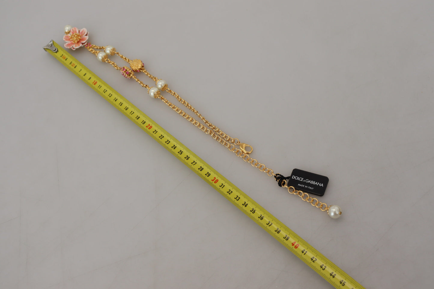 Collier Dolce & Gabbana doré à fleurs, cristaux et ornements roses