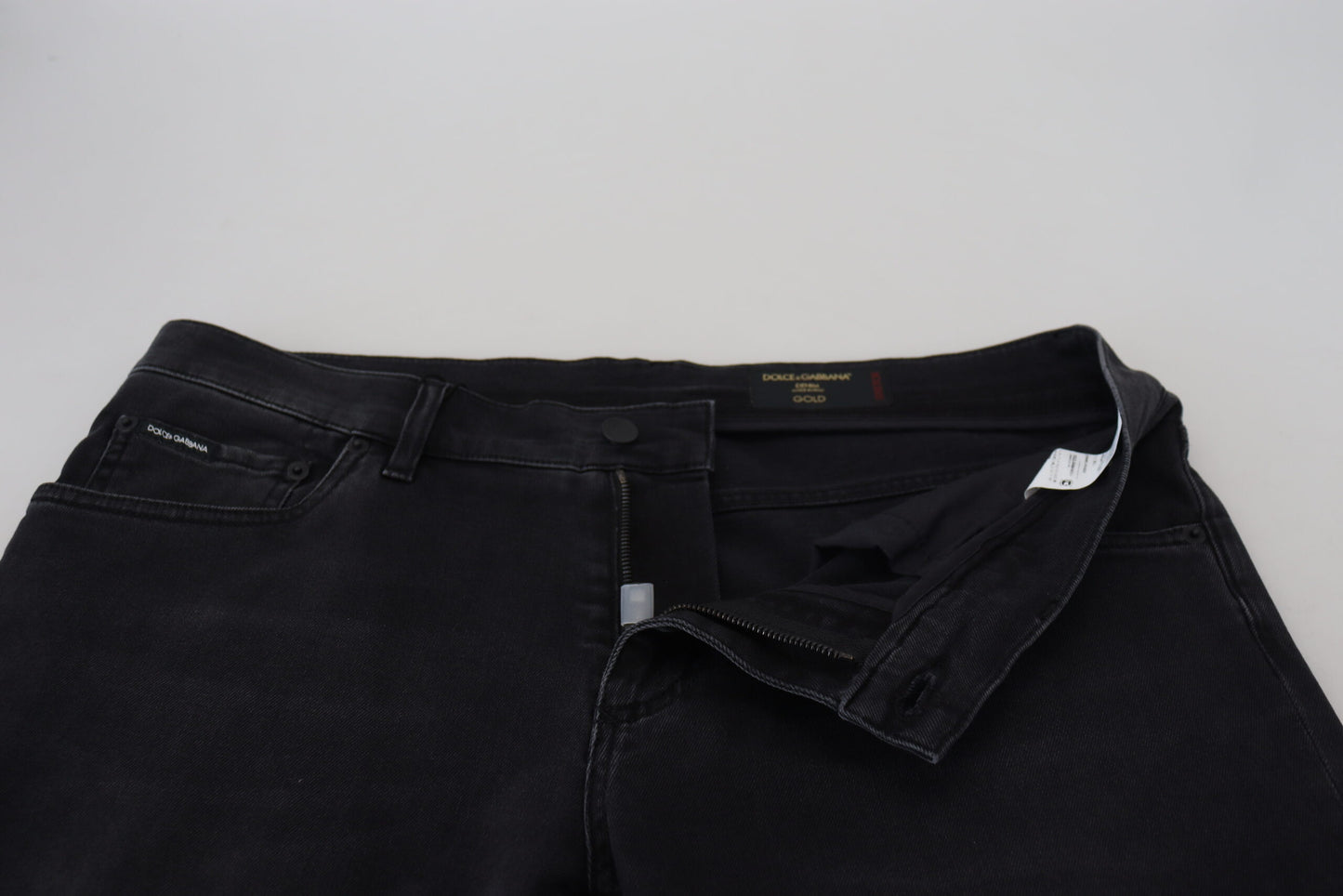 Vaqueros pitillo Dolce & Gabbana con bordado de ángel en color negro