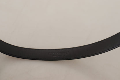 Ceinture Dolce & Gabbana en cuir de veau noir, avec boucle ardillon en métal argenté ornée du logo.