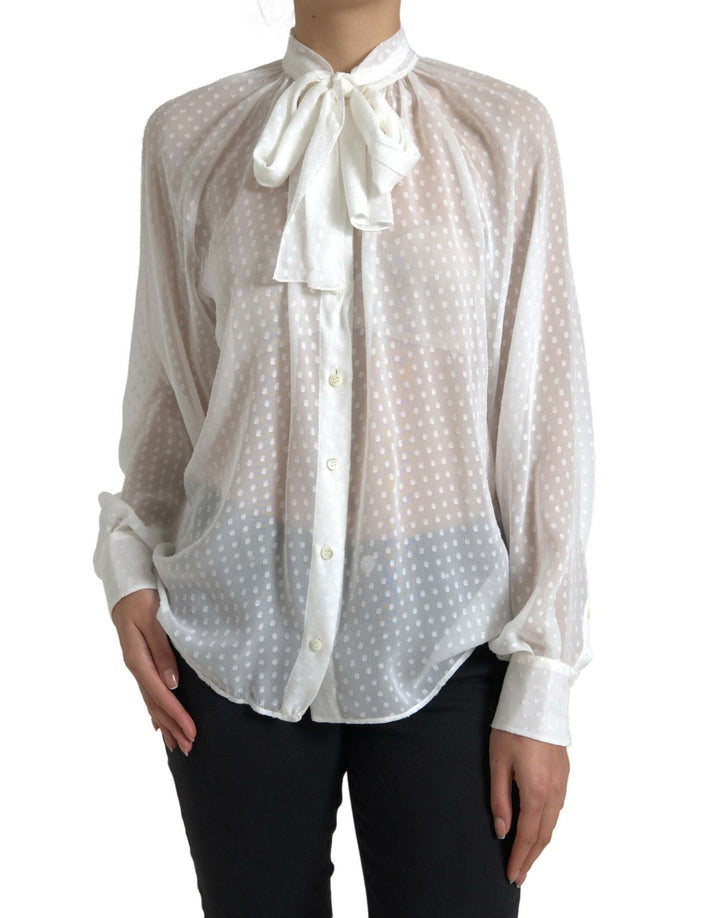Blusa blanca de seda transparente con cuello anudado y lunares de Dolce & Gabbana