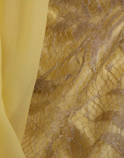 Mini-robe Dolce & Gabbana en dentelle jaune et cristaux