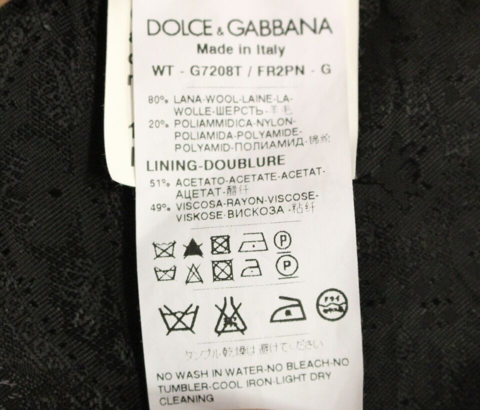 Dolce & Gabbana Gilet sans manches en laine rayée noire avec logo
