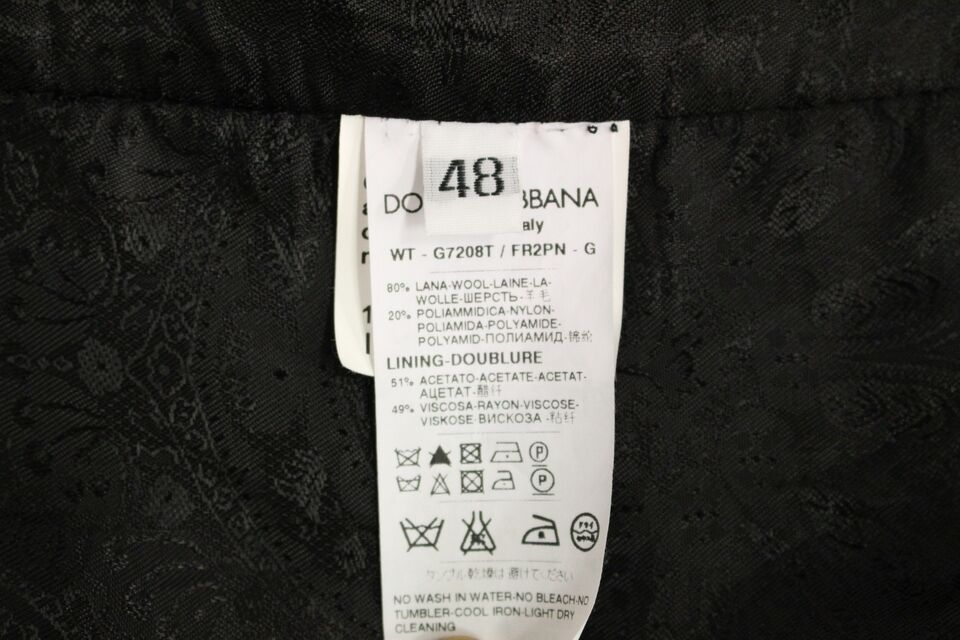 Dolce & Gabbana Gilet sans manches en laine rayée noire avec logo