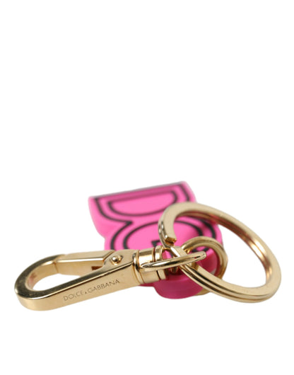 Porte-clés Dolce & Gabbana rose en caoutchouc avec logo DG en métal doré