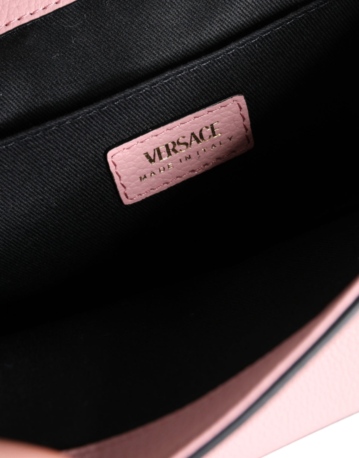 Bolso de hombro cruzado Versace de cuero de becerro granulado rosa con logotipo