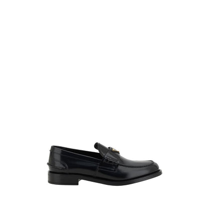 Mocassins Prada en cuir noir avec logo
