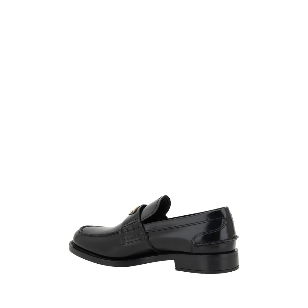 Mocassins Prada en cuir noir avec logo