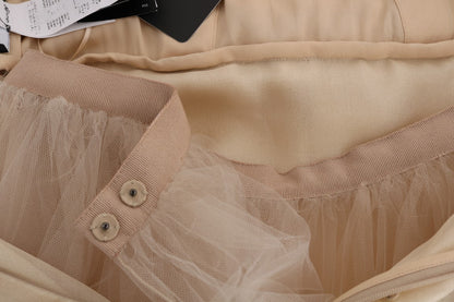 Robe Dolce & Gabbana en soie dorée ornée de cristaux