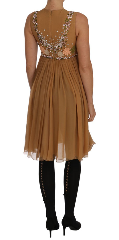 Robe Dolce & Gabbana en soie dorée et cristal, coupe trapèze