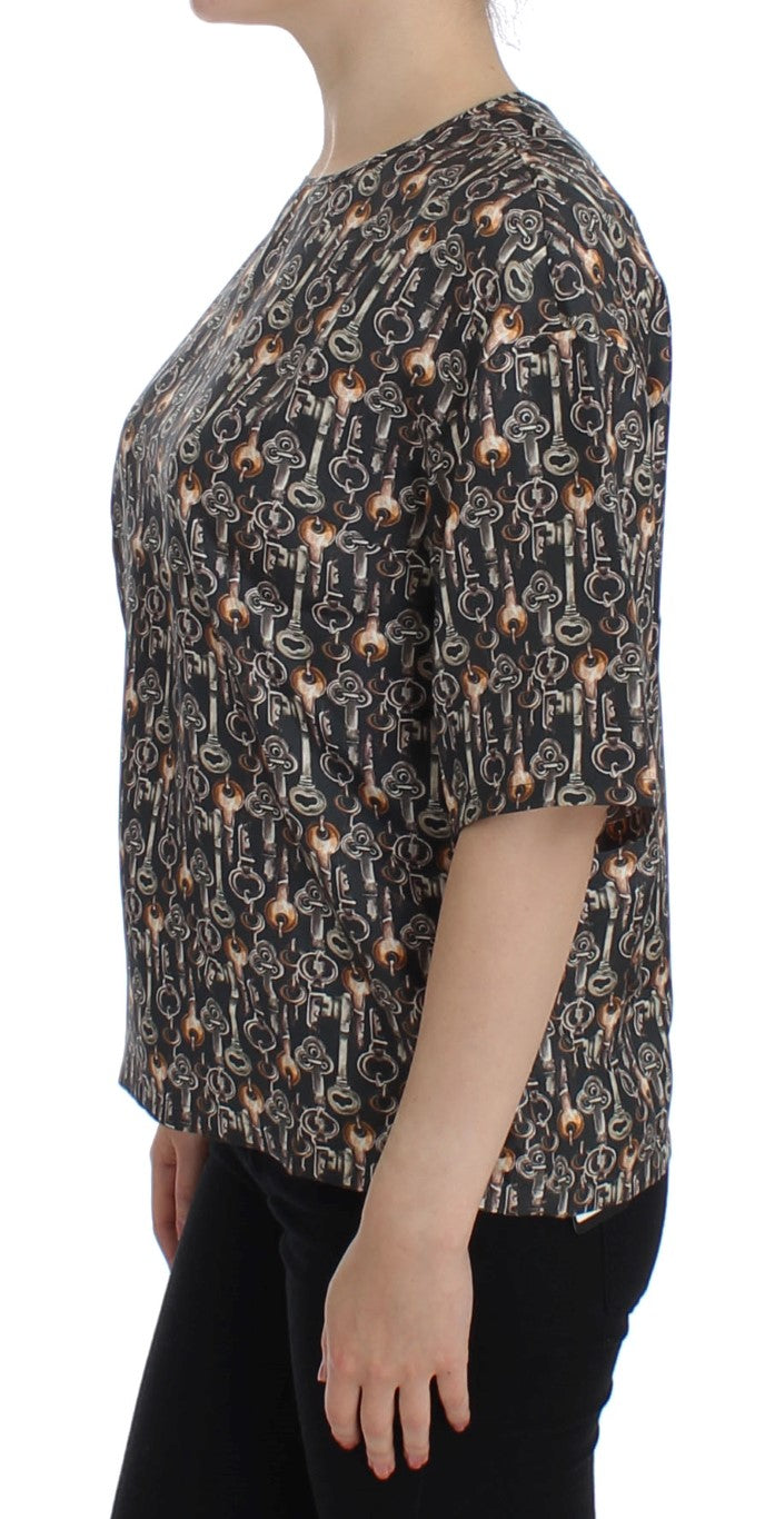 Blusa de seda gris con estampado de llave dorada Dolce & Gabbana