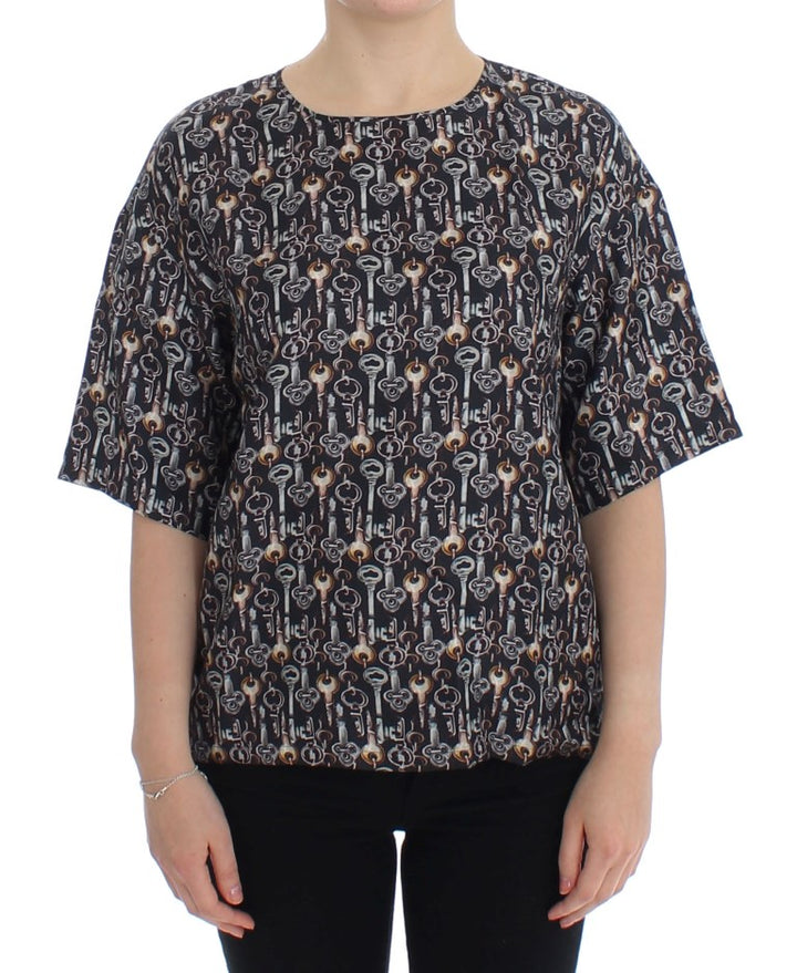 Blusa de seda gris con estampado de llave dorada Dolce & Gabbana