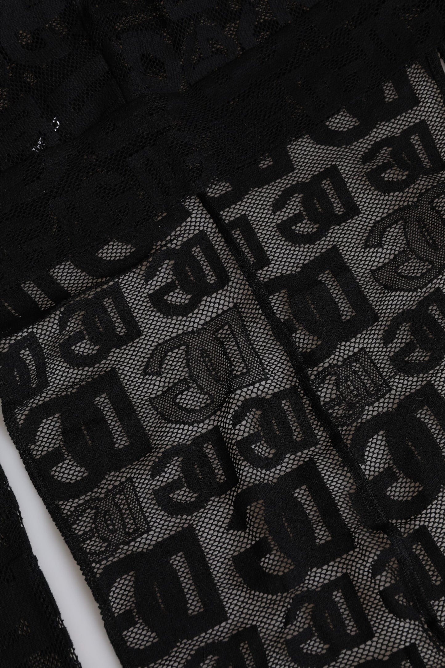 Gorro tipo turbante de malla negra con logo de Dolce & Gabbana