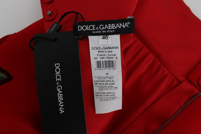 Short en soie rouge Dolce & Gabbana avec roses en cristal