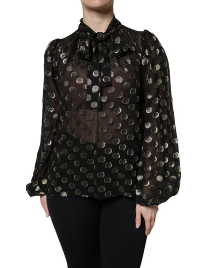 Blusa Dolce & Gabbana negra transparente con cuello anudado y lunares