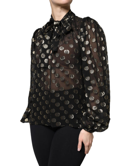 Blusa Dolce & Gabbana negra transparente con cuello anudado y lunares