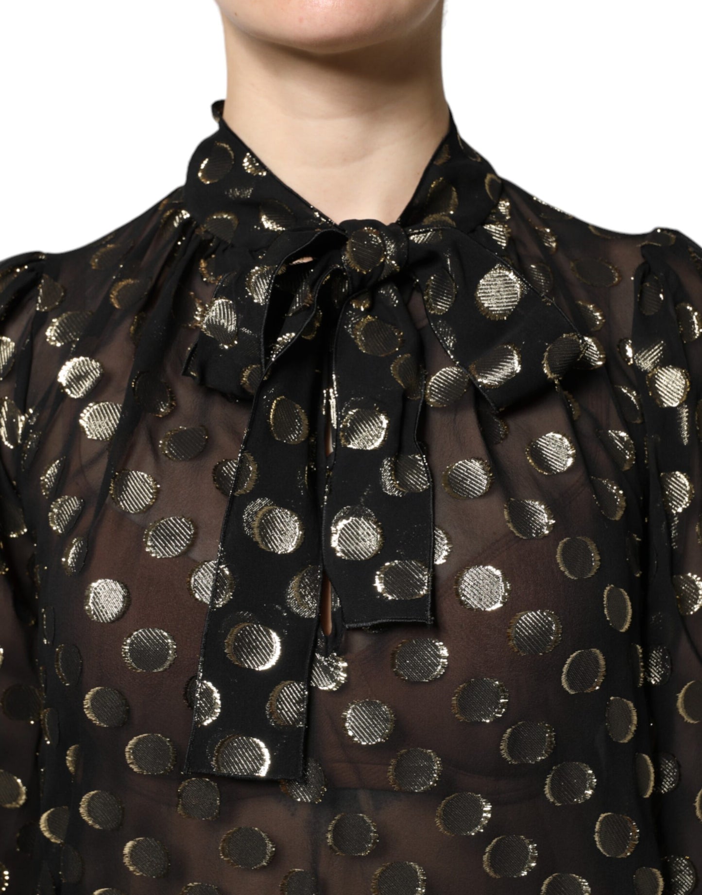 Blusa Dolce & Gabbana negra transparente con cuello anudado y lunares