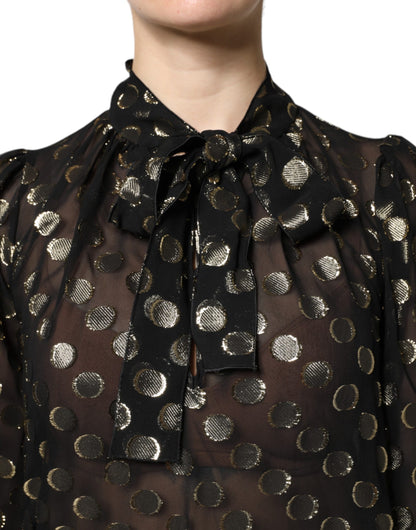 Blusa Dolce & Gabbana negra transparente con cuello anudado y lunares
