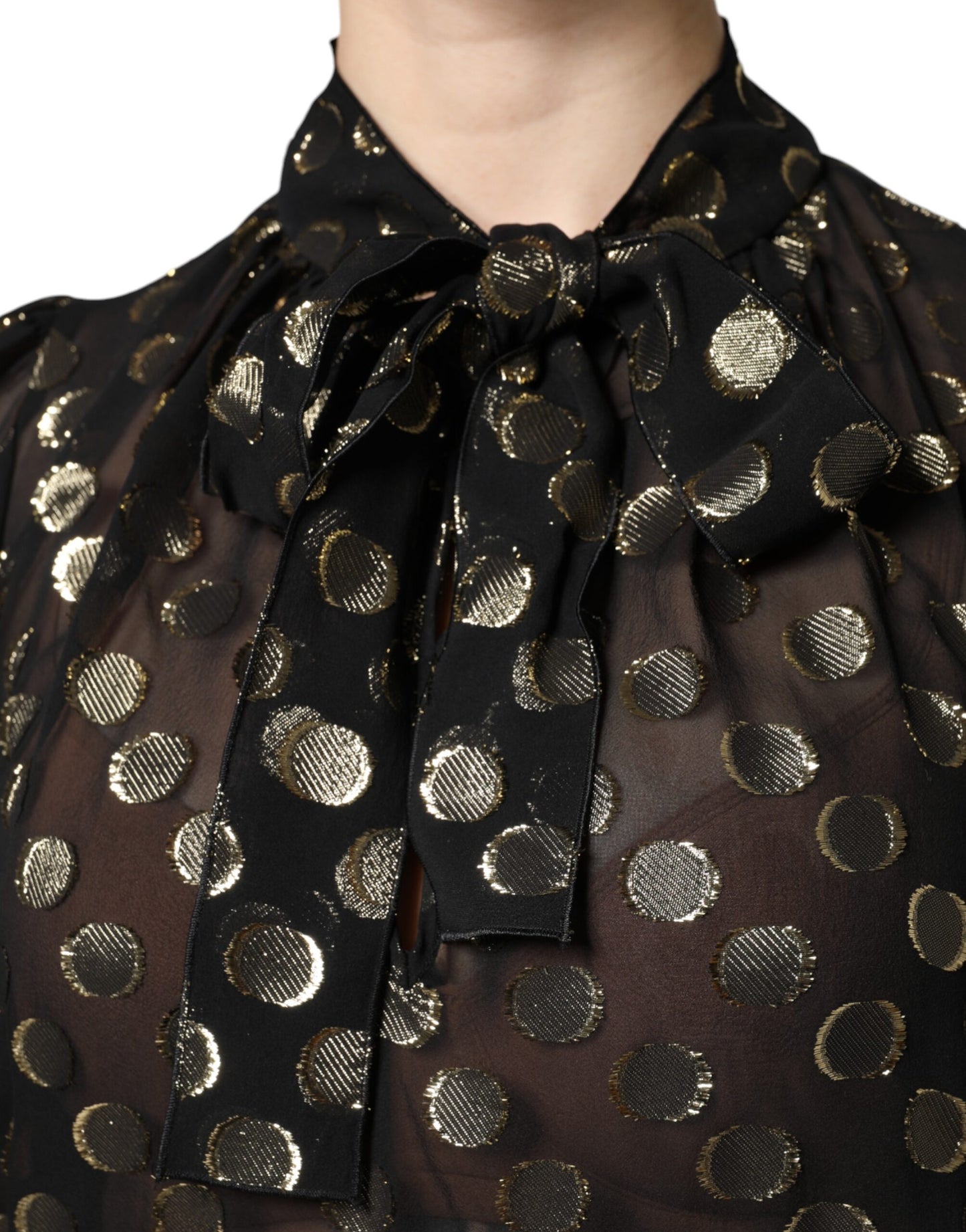 Blusa Dolce & Gabbana negra transparente con cuello anudado y lunares