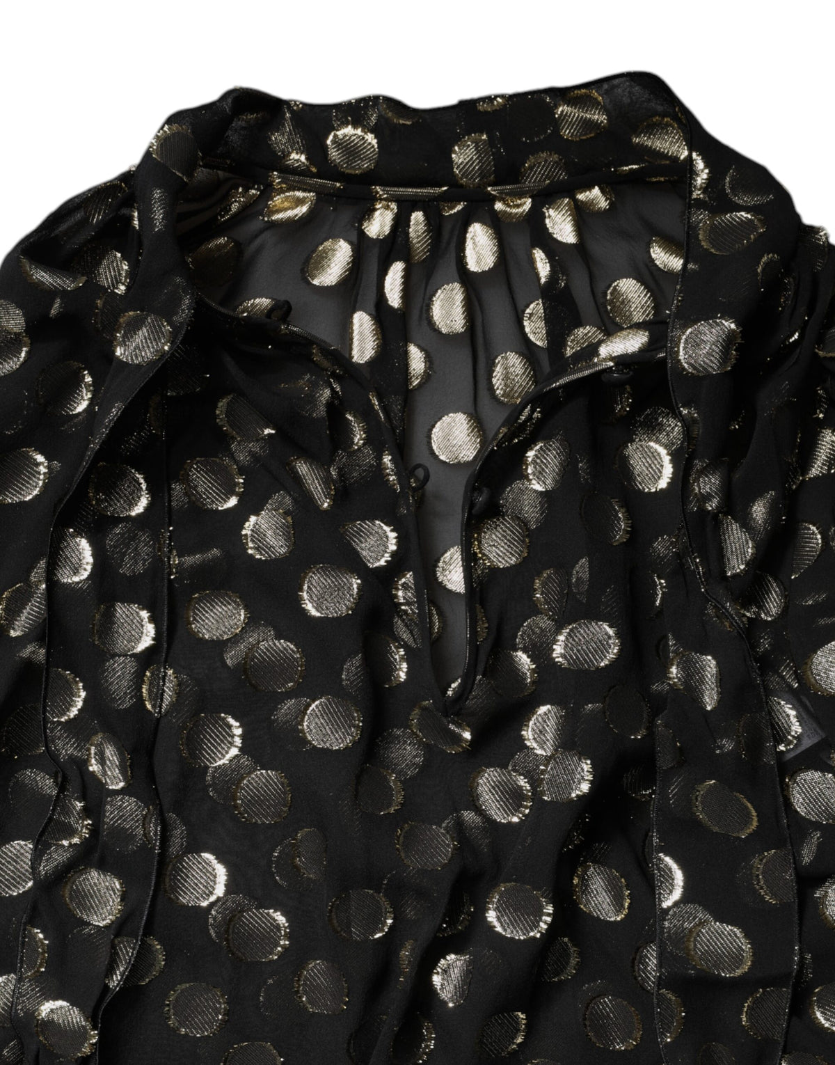 Blusa Dolce & Gabbana negra transparente con cuello anudado y lunares