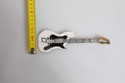 Broche en épingle à guitare Dolce & Gabbana en laiton doré avec perles et logo