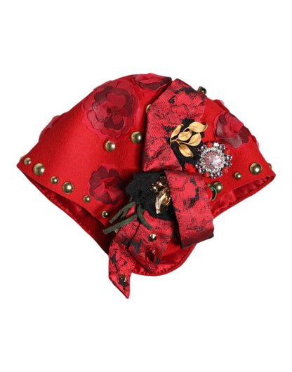 Sombrero adornado con broche de rosas doradas con cristales rojos de Dolce & Gabbana