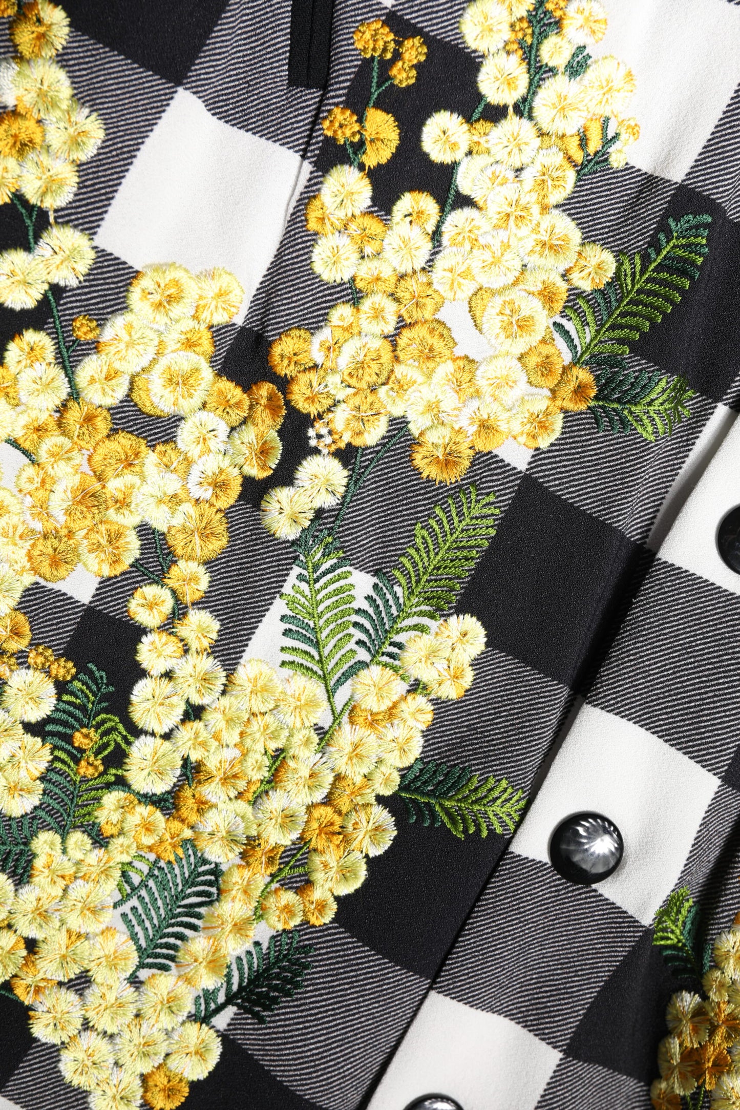 Chaqueta con botones de cuadros en blanco y negro y estampado floral de Dolce & Gabbana