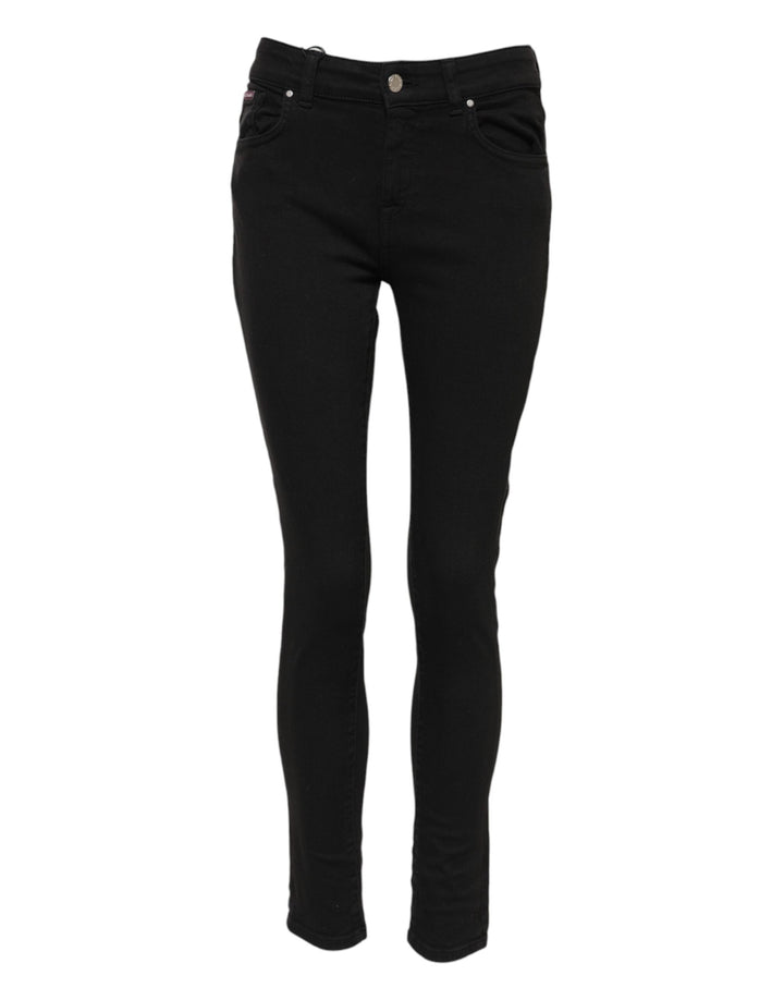 Jeans de mezclilla ajustados de tiro medio con logo de algodón negro Dolce & Gabbana