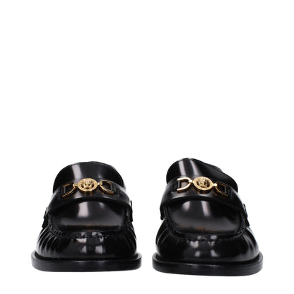 Mocasines destalonados de cuero negros de Versace