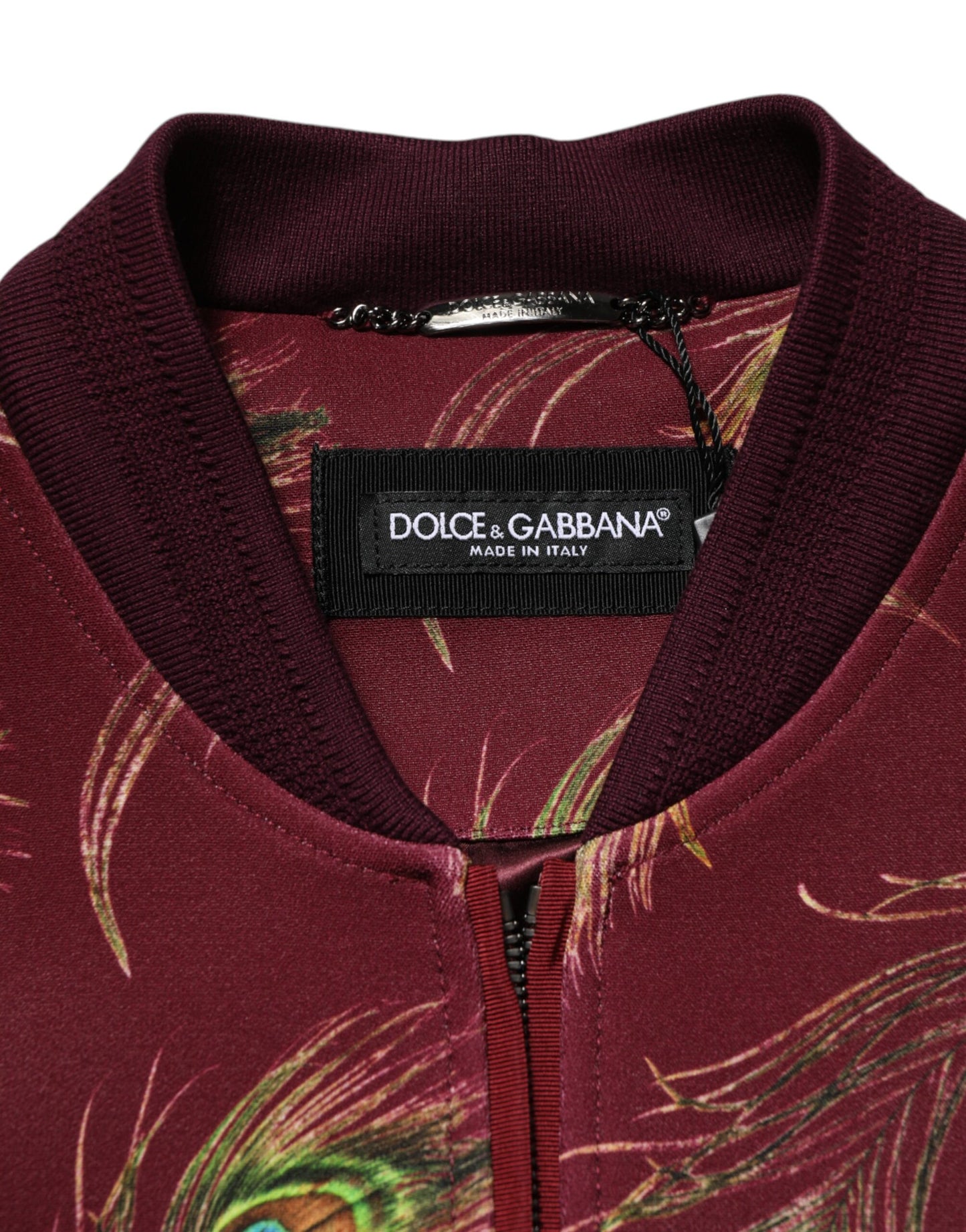 Chaqueta Bomber Dolce & Gabbana con Estampado de Plumas de Pavo Real Granate