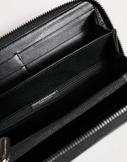 Portefeuille Continental zippé Dolce & Gabbana en cuir noir avec plaque logo