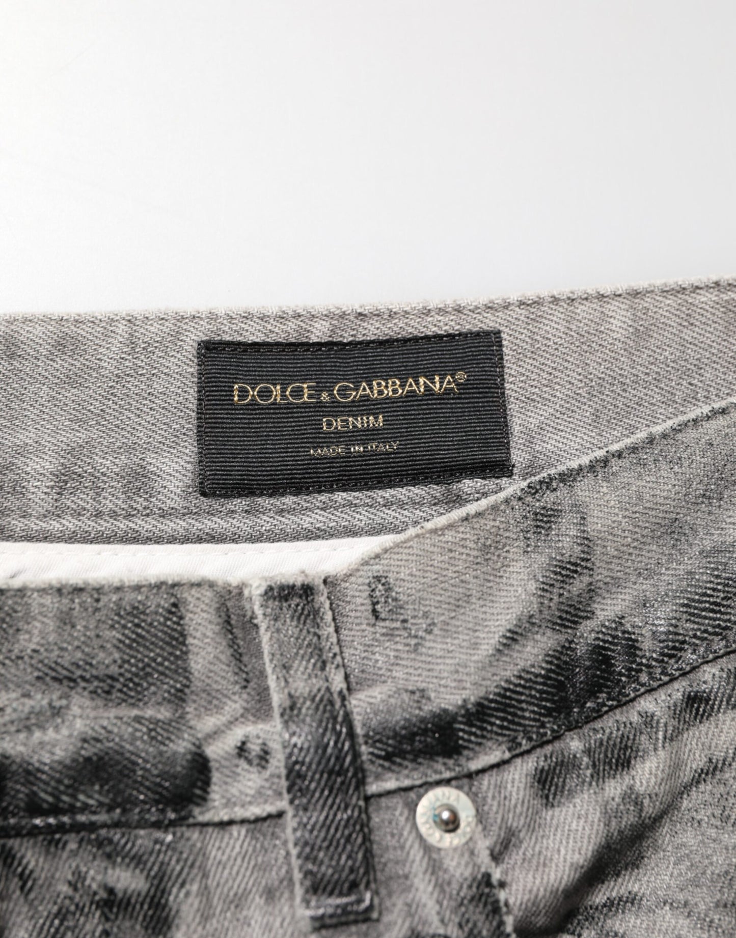 Vaqueros Dolce & Gabbana negros y grises con estampado gráfico