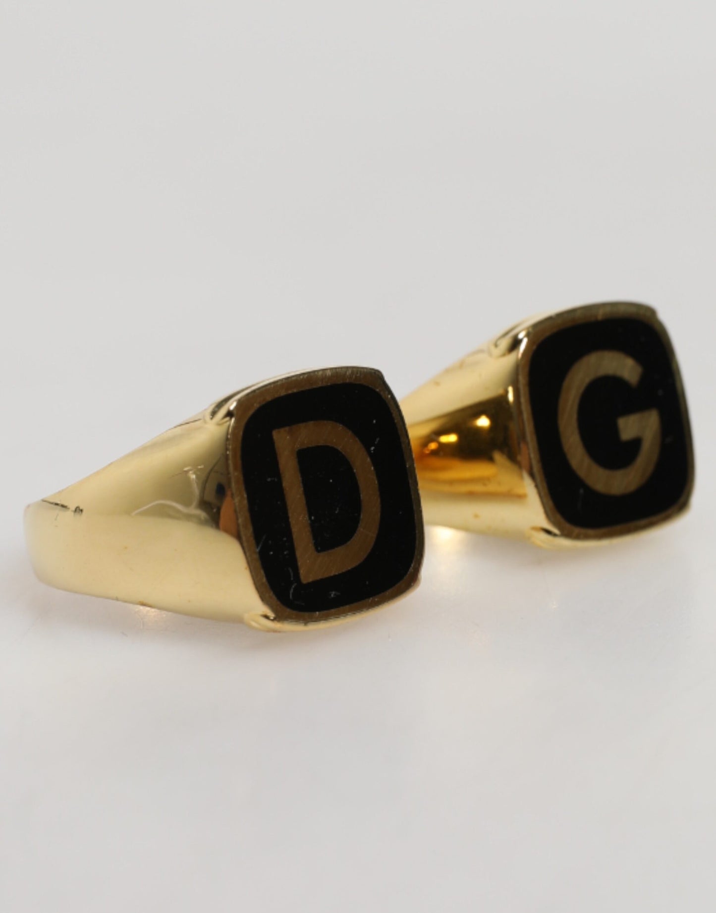 Bagues réglables Dolce & Gabbana en laiton doré, émail noir "DG"