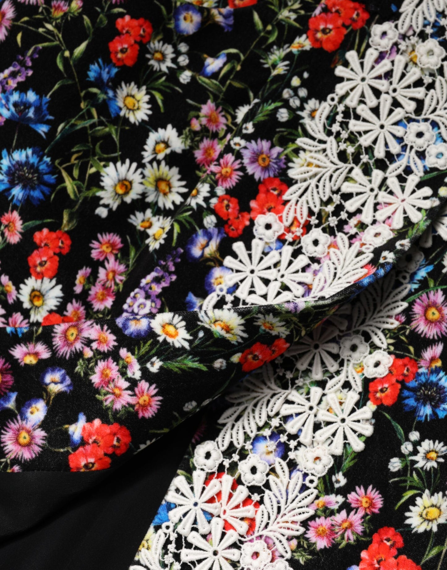 Minifalda de talle alto de algodón con encaje floral negro de Dolce & Gabbana