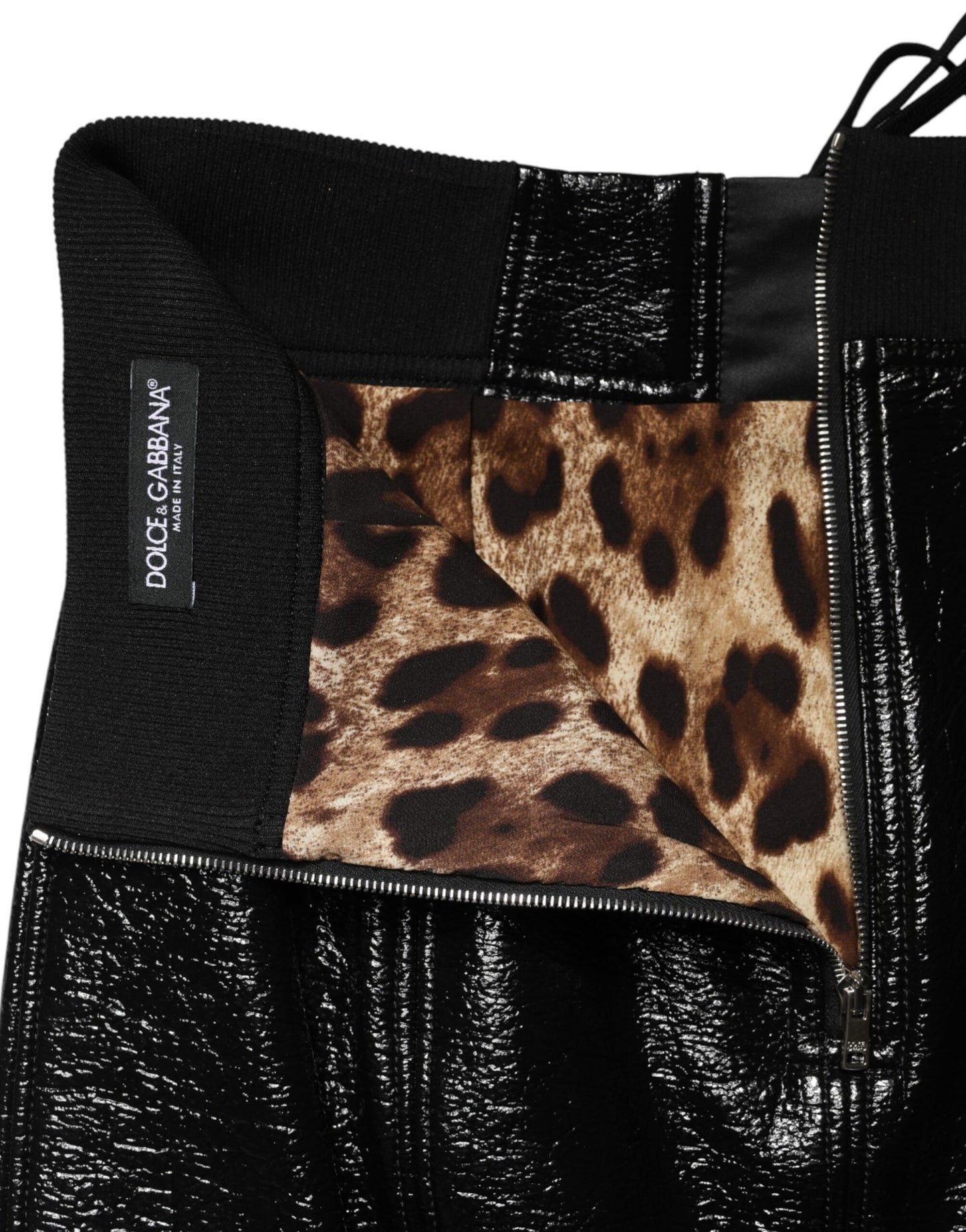 Mini-jupe enduite noire en nylon Dolce & Gabbana avec détails œillets
