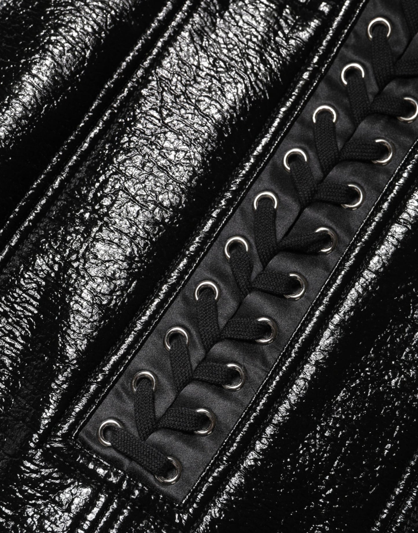 Mini-jupe enduite noire en nylon Dolce & Gabbana avec détails œillets
