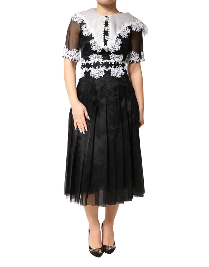 Vestido midi de seda y encaje macramé blanco y negro de Dolce & Gabbana